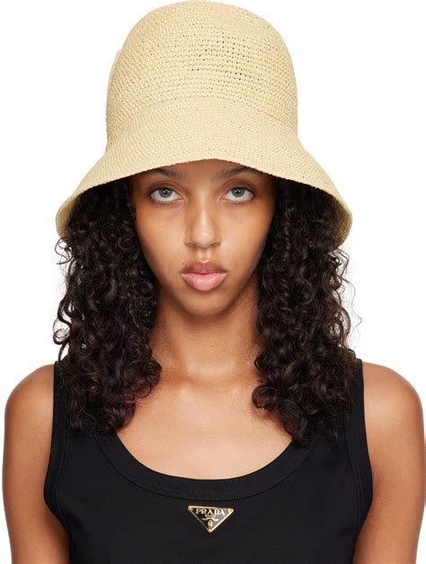 prada cappotti privete griffe|Raffia bucket hat in beige .